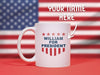 text says Your Name Here, image features white mug with red white and blue American design with typography that says William for President with Red Stars and Stripes sitting on a blue surface with an American flag backdrop