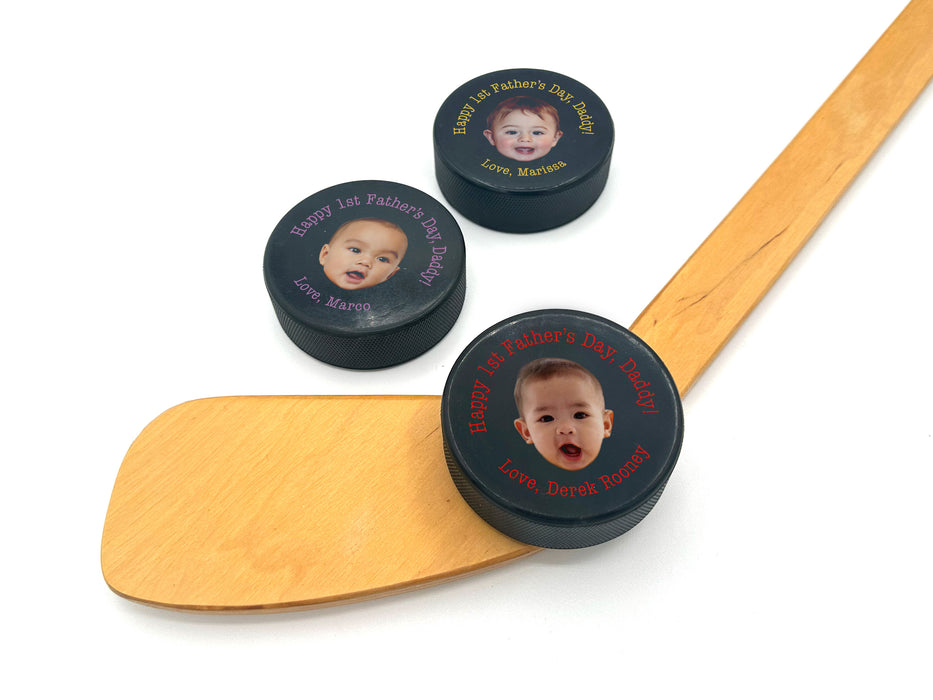 a wooden spoon with a picture of a baby on it