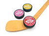 three hockey puck with a red, pink, and yellow player and team name design with a hockey stick design with the player and team name and information