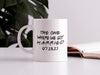 white mug on white table with friends design typography that says The One Where We Got Married 07.28.23 surrounded by notebook and a house plant