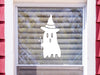 Ghost Witch sticker (in white) is shown stuck to the exterior of a window.