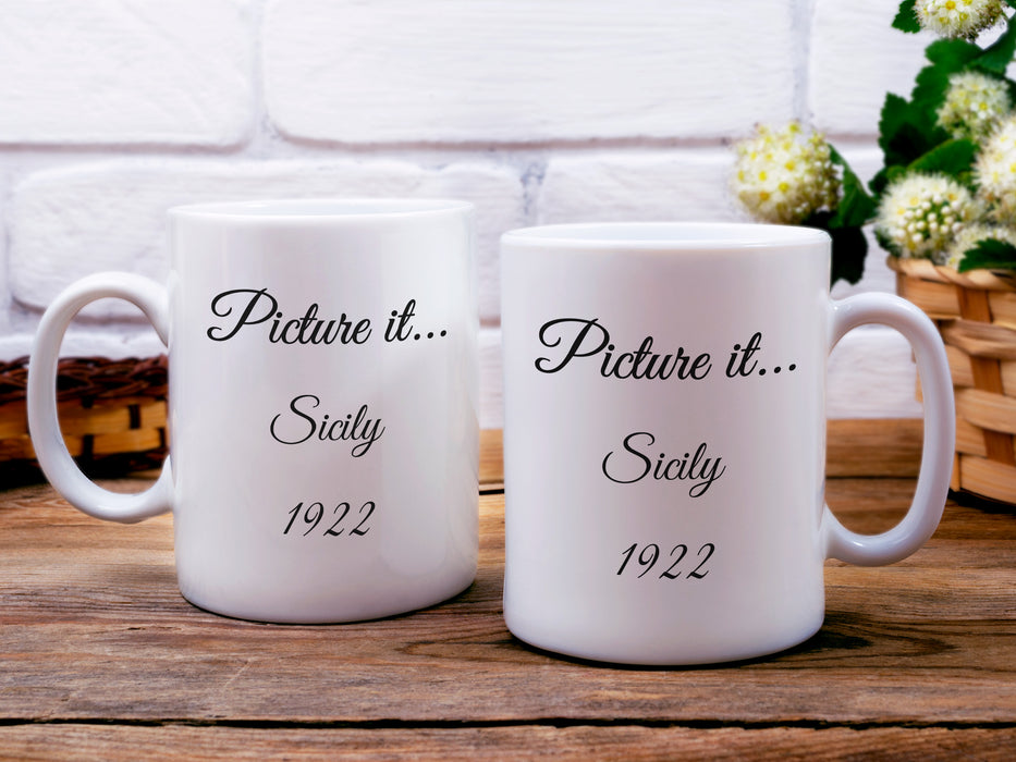 two white mugs on wooden table with golden girls inspired typography design with quote that says Picture it...Sicily 1922 in front of a basket of house plants