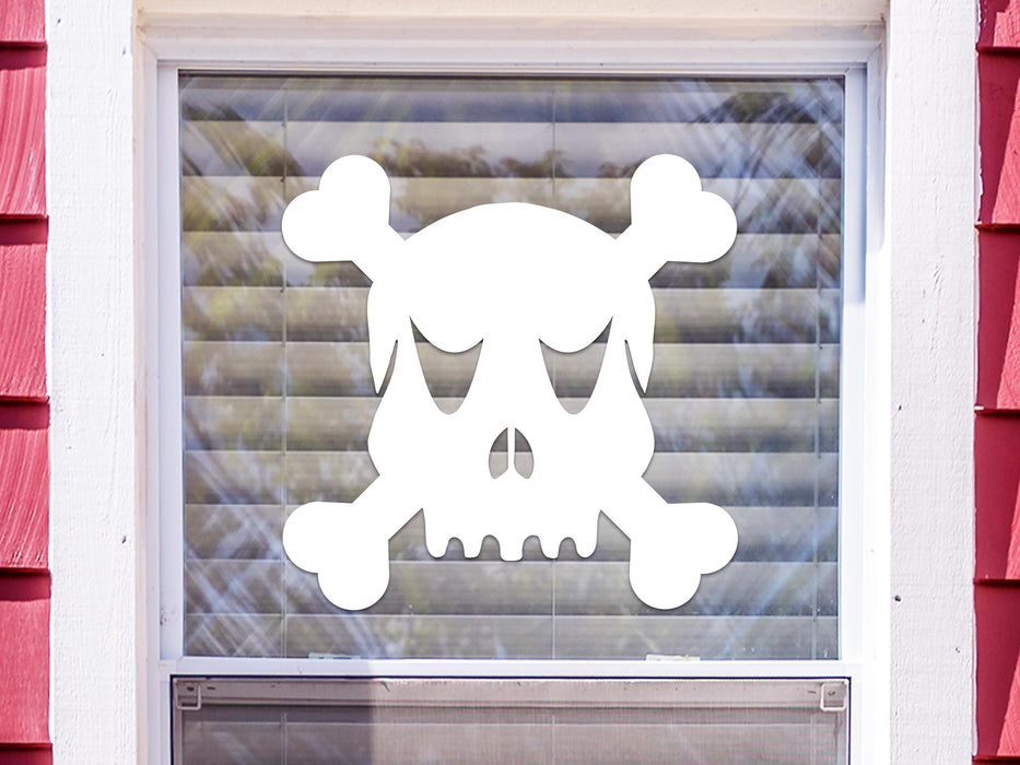 Skull and Crossbones sticker (in white) is shown stuck to the exterior of a window.