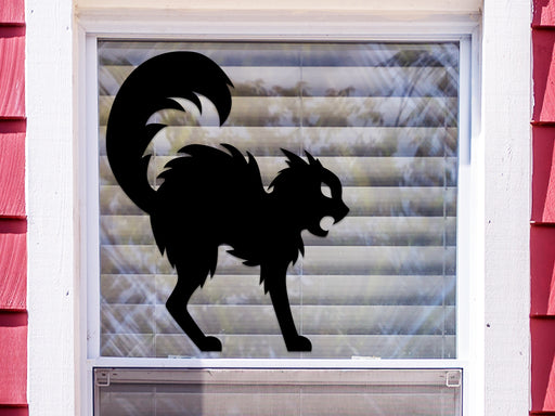 black cat silhouette vinyl sticker on exterior window of a house