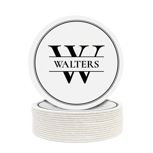 Single coaster is shown on top of a stack of coasters on a white background. Coasters feature Initial Monogram design. Design has a monogram for the last name "Walters". Design is printed on a white coaster.