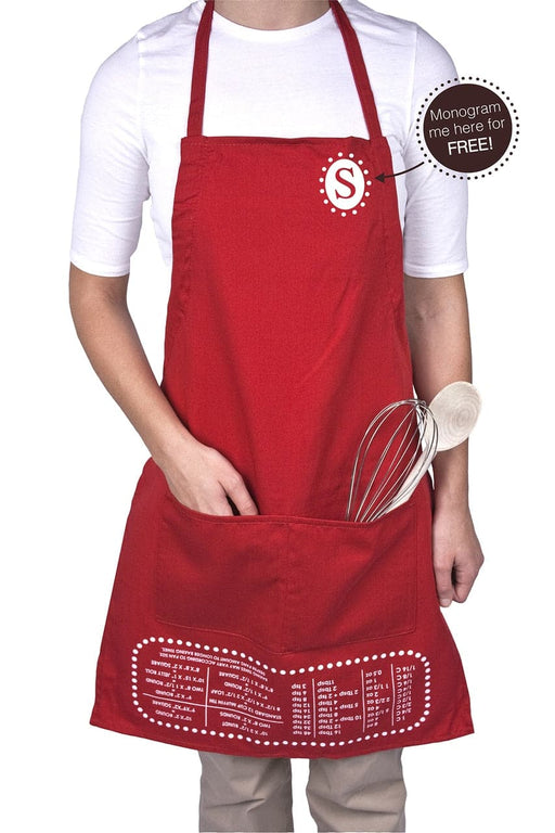 Man wearing a personalized sheet sheet apron with a whisk and spoon sitting in the apron