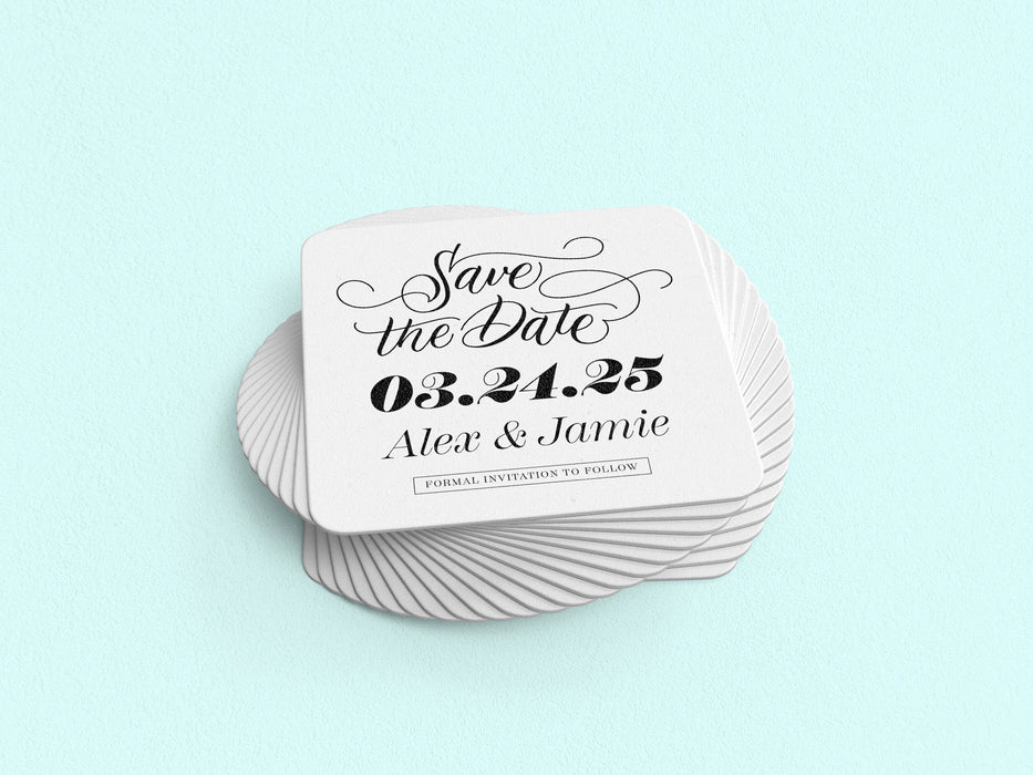 Stack of coasters swirled out on a light blue background. Coasters say Save the Date, wedding date, married couple names, and formal invitation to follow.