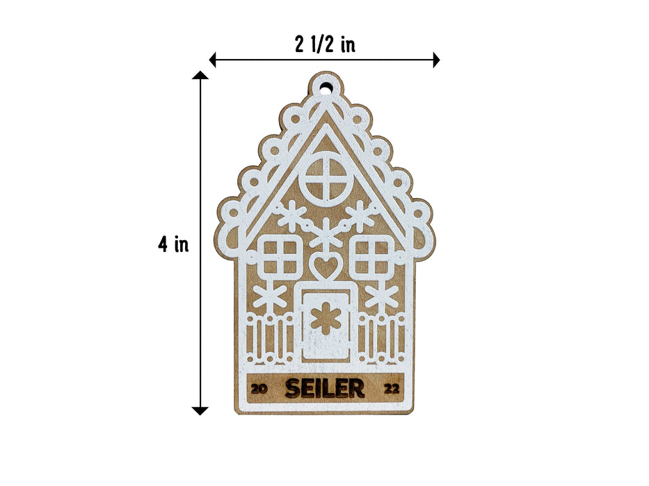 Measurements of ornament shown. Measurements are 2 1/2 inches wide and 4 inches tall.