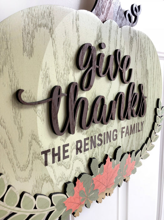 personalized give thanks door sign that says The Rensing Family