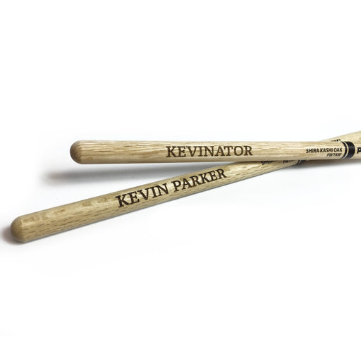 laser engraved wooden drum sticks that say Kevinator, Kevin Parker