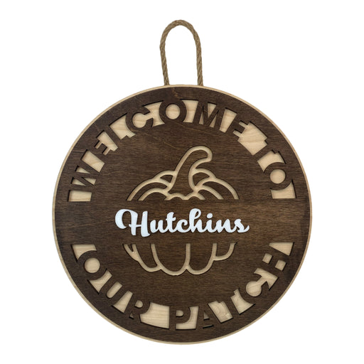 Welcome to our patch personalized door hanger with the family name Hutchins on it