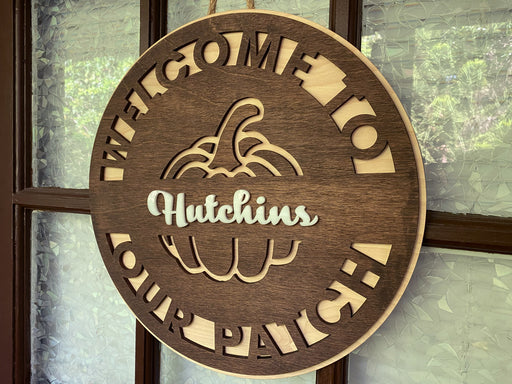 Welcome to our patch personalized door hanger with the family name Hutchins on it