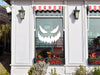 Scary  pumpkin face vinyl sticker placed on shop exterior window