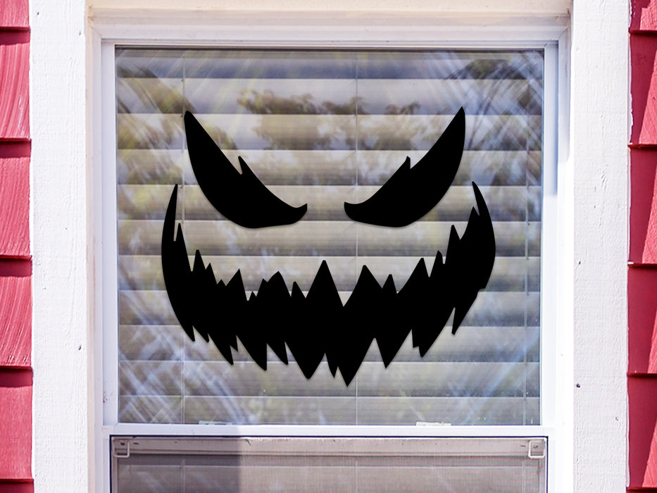 scary pumpkin face vinyl sticker on window