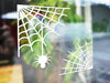 spider web vinyl sticker against blurred background