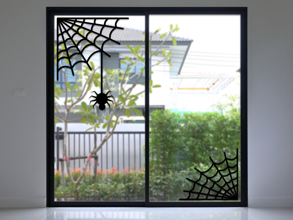 spider web vinyl sticker on a sliding glass door