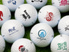 arious printed on golf balls with logos and designs on them