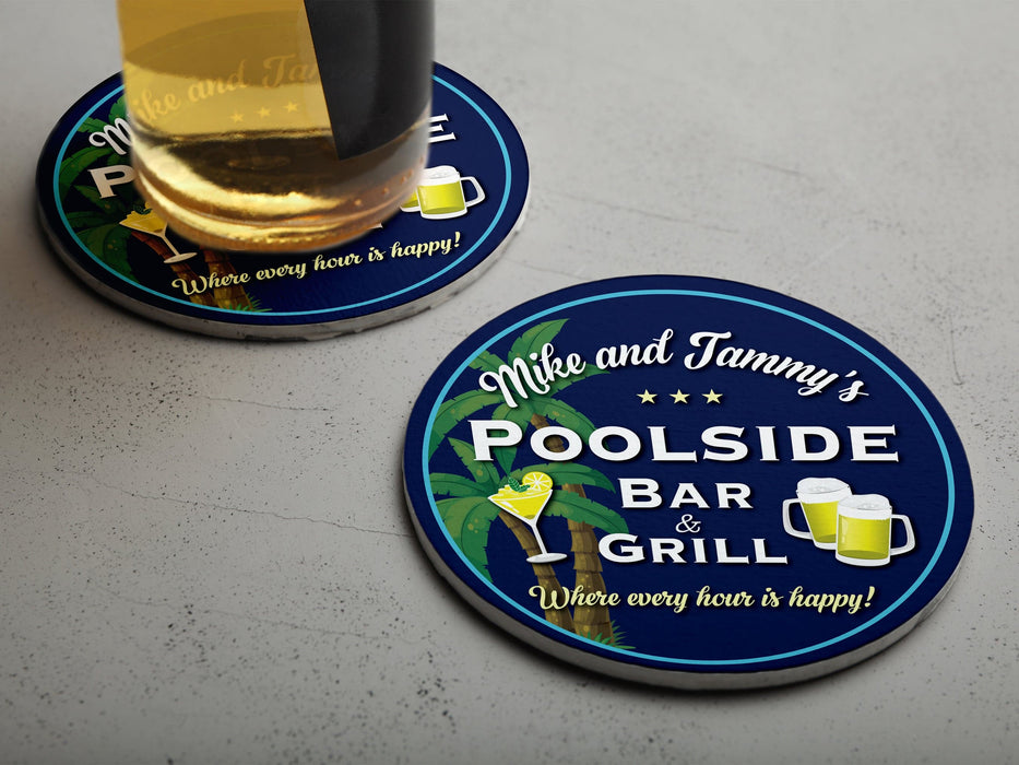 One coaster has a drink on it and an empty coaster sits beside it. Coasters display a custom design for a poolside bar & grill.